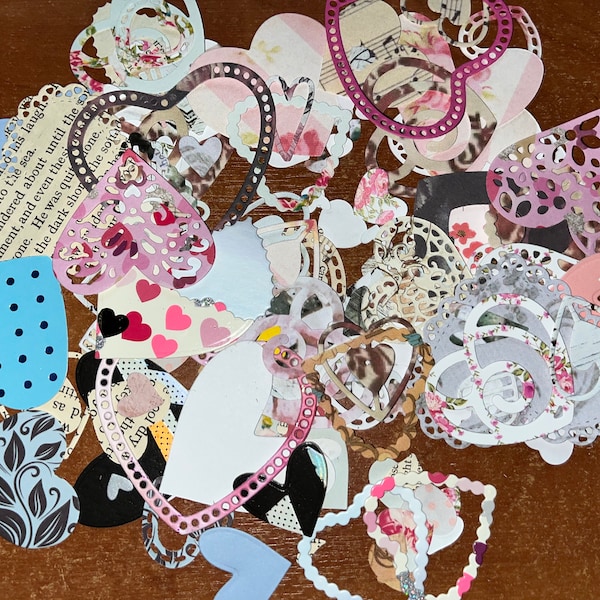 Die cut paper and card hearts.  great for card making, junk journaling & scrap booking. Pretty hearts