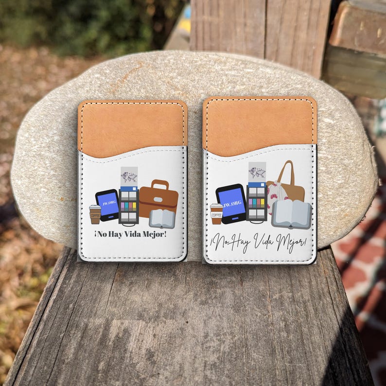 May include: Two brown leather phone wallets with a white pocket insert. The pocket insert features a colorful illustration of a coffee cup, a laptop, a briefcase, a book, and a phone with the text "JW.ORG". The text "No Hay Vida Mejor!" is printed below the illustration.