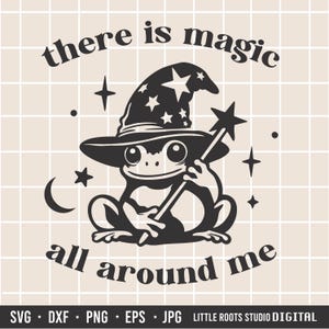 May include: Black and white digital art of a frog wearing a wizard hat and holding a star wand. The text "there is magic all around me" is above and below the frog. Stars and a crescent moon are also included in the design.