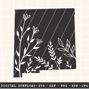 May include: Black and white silhouette of the state of New Mexico with white floral designs inside the outline.