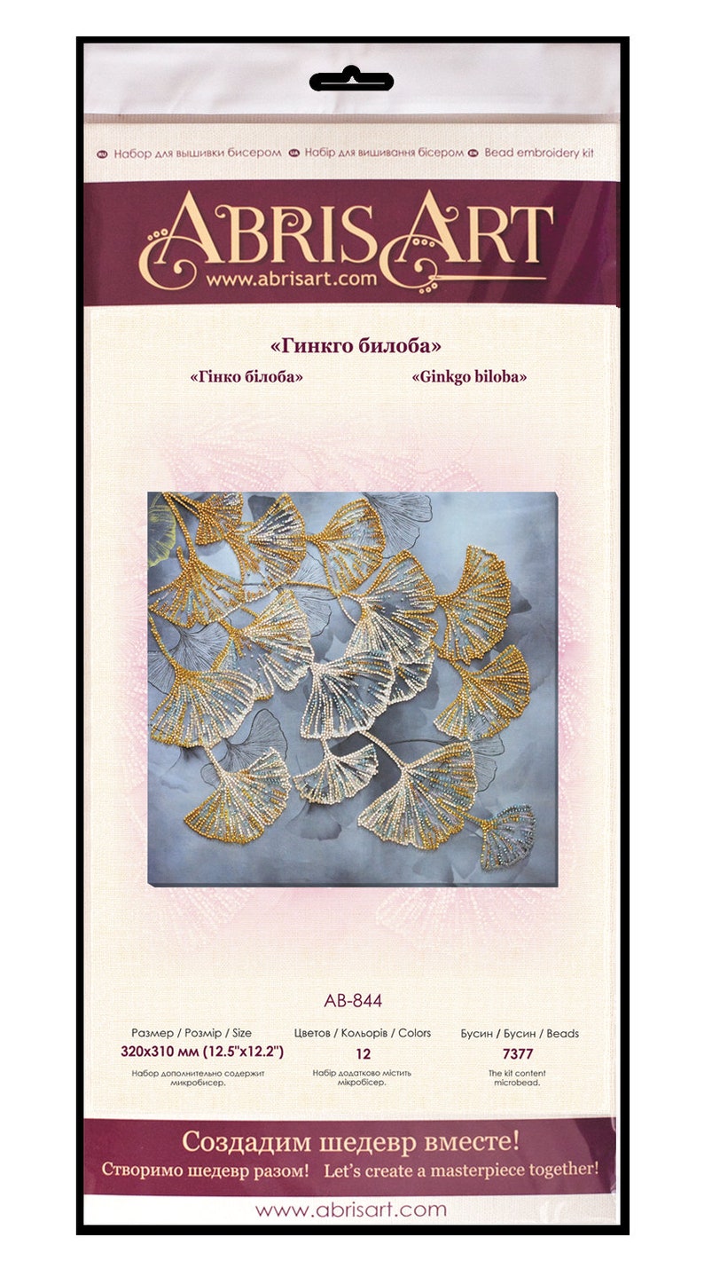 May include: A bead embroidery kit featuring a design of a Ginkgo biloba tree with gold and white beads on a blue background. The kit includes 7377 beads and 12 colors. The size of the finished piece is 12.5 inches by 12.2 inches.