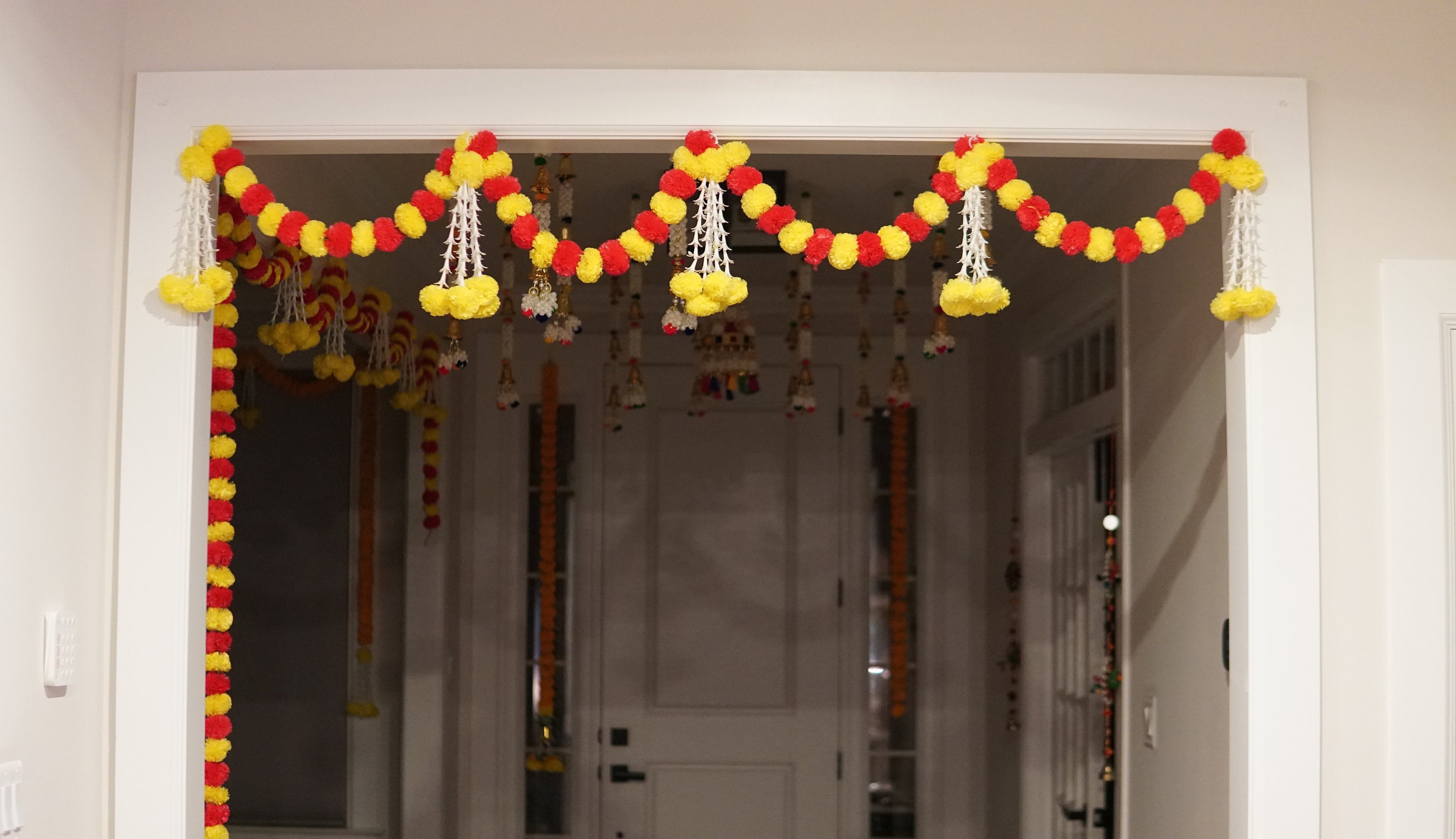 Yellow + Red Marigold Garlands Garage Door and Indoor
