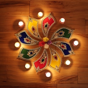 Diwali Rangoli with 8 PC clay wax Candles and few flowers| Table centerpiece, Halloween & Diwali decoration, Diwali entrance rangoli/gifts !