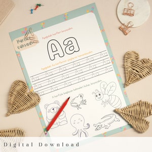 May include: A printable worksheet for learning the letter "A" in Turkish. The worksheet features a large letter "A" at the top, followed by lines for practicing writing the letter.  The worksheet also includes a section for colouring in pictures of animals that start with the letter "A".
