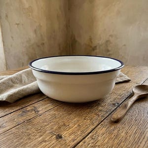 May include: A rustic wooden sign with the text "Welcome to our home" in a handwritten style. The sign features a distressed finish and a simple, inviting design, perfect for a front porch or entryway.