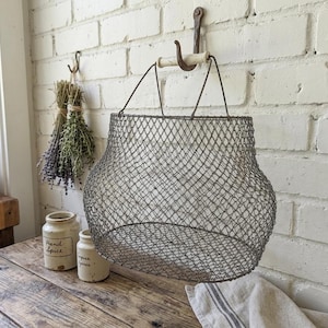 Cesta de alambre plegable grande de estilo vintage con asas de plástico, estilo retro industrial rústico, ideal para colgar y cosechar manzanas, patatas y huevos.