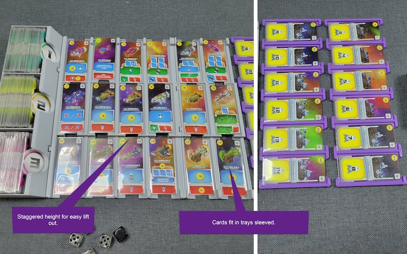 May include: A board game organiser with multiple trays and card holders. The trays are grey and purple, holding colourful cards with spaceship illustrations. Dice are scattered nearby. The organiser is designed for easy card access.