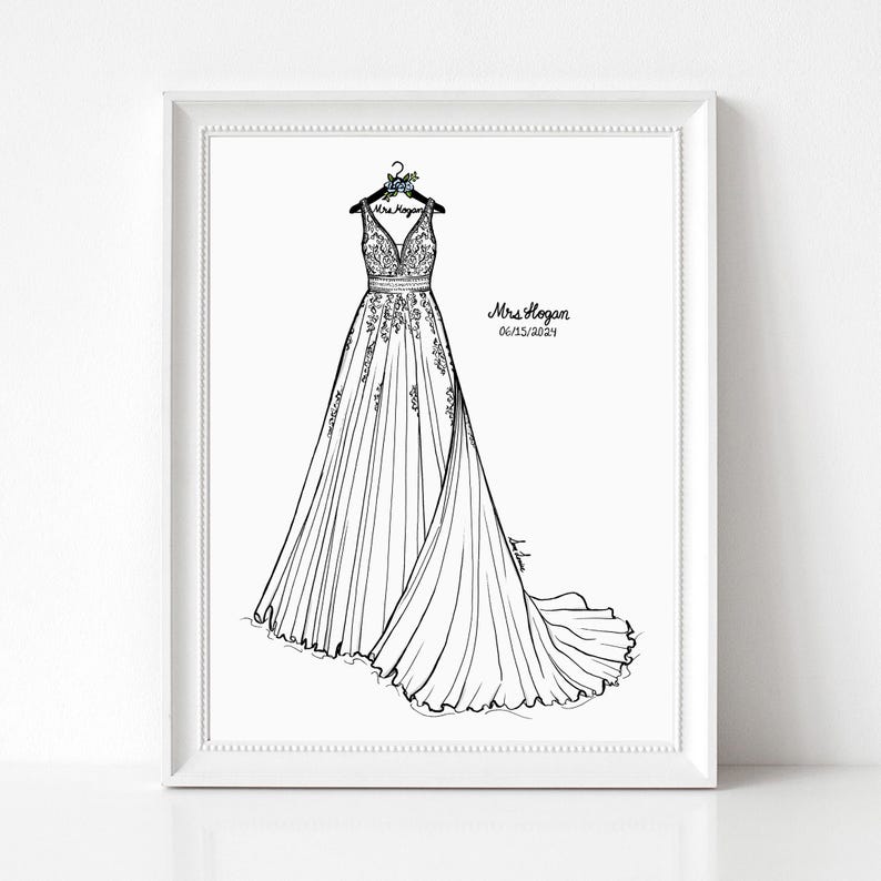 May include: A framed black and white line art illustration of a wedding dress hanging on a hanger. The dress features a V-neckline, intricate bodice detailing, and a long flowing skirt. The text Mrs. Hogan and 06/15/2024 is printed on the right.