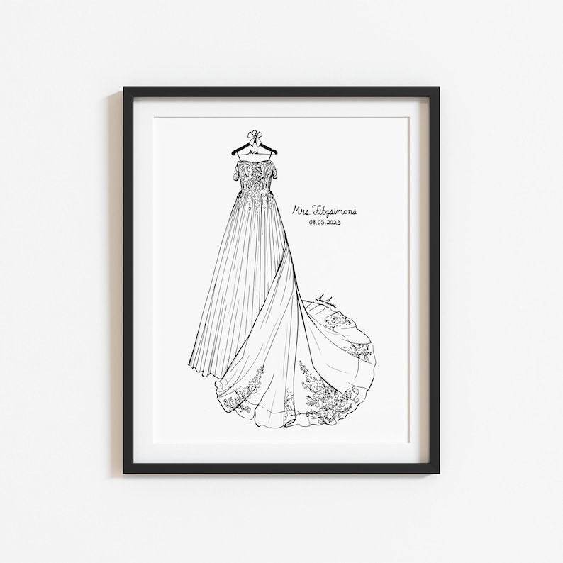 May include: A black and white line art illustration of a wedding dress hanging on a hanger, framed in black. The dress features a lace bodice and a long, flowing skirt with floral details. Text reads Mrs. Fitzsimons and 08.05.2023.