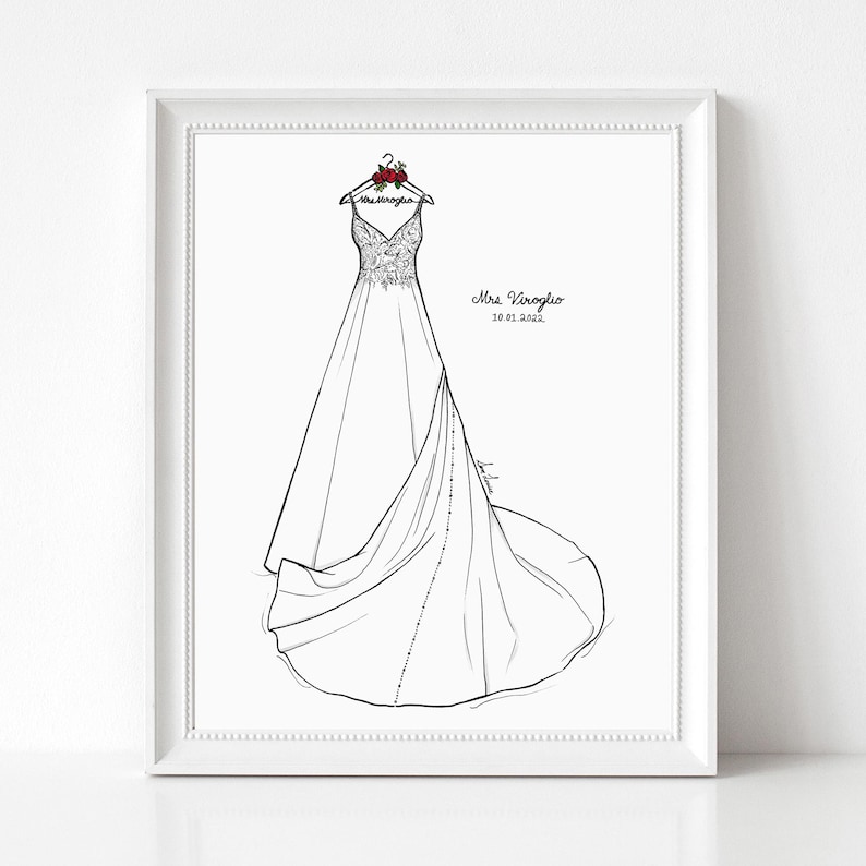 May include: A framed line art illustration of a wedding dress hanging on a hanger with red roses. The dress features a lace bodice and a long skirt with a train. The text Mrs Viroglio and 10.01.2022 are printed on the right side of the dress.