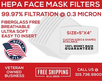 May include: A stack of white HEPA face mask filters with the text "99.97% Filtration @ 0.3 Micron" and "Size=5"x4"" in black. The filters are fiberglass free, breathable, ultra soft, and easy to insert. The text "Made in USA" is in a red, white, and blue circle. The text "Free Shipping on all orders" is in a black rectangle. The text "Call us @ 315.736.9900" is in a black rectangle.