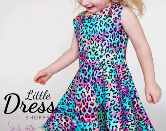 Neon Leopard Rainbow Twirly Dress, niño, niñas, niño pequeño, giro, brillante, años 90, estampado animal, círculo completo, bolsillos, brillante, suave, adolescente