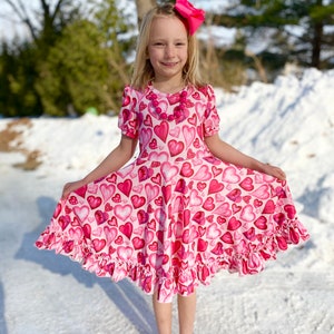 Pink Hearts Twirl Dress, twirly, pink dress, full circle skirt. Valentine’s Day, ruffle bottom, balloon sleeves, cap sleeve, buttery soft