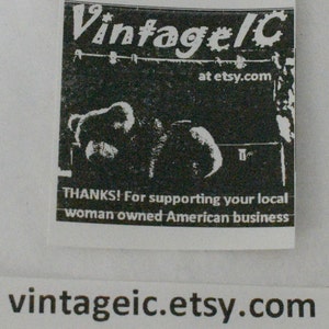 May include: A black and white sticker with the text "Vintage/C at etsy.com". The sticker also includes the text "THANKS! For supporting your local woman owned American business" and "vintageic.etsy.com".