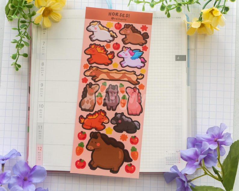 May include: A sheet of horse-themed stickers featuring cartoon horses in brown, orange, pink, and purple. The stickers include apples and carrots. The word "HORSES!" is printed at the top.