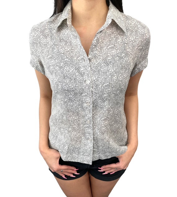 Camicia chanel prezzo new arrivals