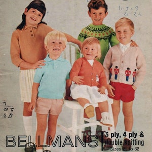 May include: A vintage knitting pattern featuring five children wearing colorful sweaters. The pattern is for sizes 21 to 32 and includes instructions for 3 ply and 4 ply double knitting.