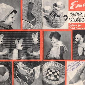May include: A vintage knitting pattern booklet from Emu titled "Knitted Novelties" with a price of 9 pence. The booklet features illustrations of knitted items including a hat, a teapot, a pair of bunny egg cozies, a scarf, a dog sweater, a football, a pram, a cushion, and a pair of socks.