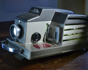 Aldis 303 vintage slide projector. Upgraded to LED, rewired and PAT tested. Fully working.