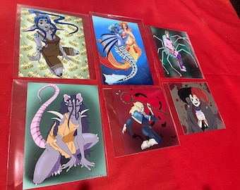 May include: Six different illustrated cards featuring various fantasy creatures. The cards are printed on white cardstock and have a glossy finish. The illustrations are colourful and detailed, and the cards are perfect for collectors or fans of fantasy art.