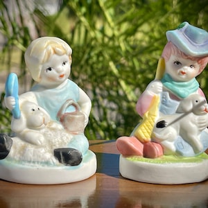 Vintage Bisque Porcelain Boy and Girl Figurines