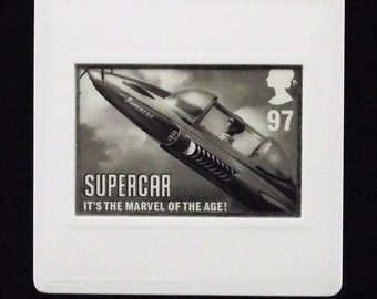 Supercar Brooch - From the 'FAB - Gerry Anderson' Collection using a Royal Mail Postage Stamp issued in 2011 plus presentation card.