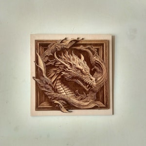 May include: A wooden wall art piece featuring a detailed carving of a dragon's head with intricate scales and a fierce expression. The dragon is surrounded by a decorative frame and appears to be emerging from a swirling pattern.