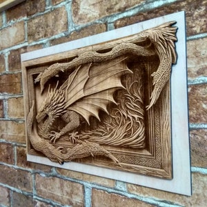 May include: A wooden wall art piece featuring a detailed carving of a dragon with its wings spread wide. The dragon is surrounded by intricate carvings of flames and vines, creating a dramatic and dynamic scene.
