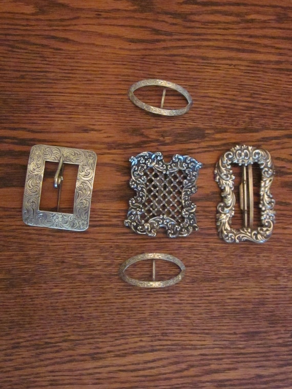 a small Collection of 5 Sterling Silver Buckles, 7