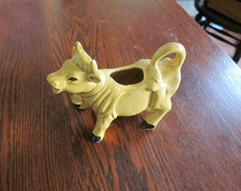 a Vintage Cow Creamer, no repairs or damage