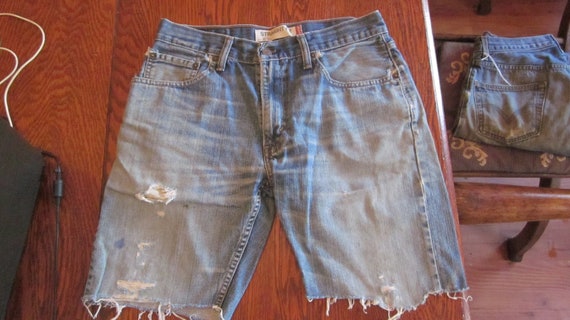 a Distressed Levi's Red Tag 505 Blue Jeans Shorts… - image 1