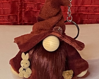 Red keychain gnome with bunny and bear