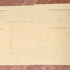 May include: A set of four sewing patterns for a witch hat, a simple hat, a flower fairy hat, and a medium felt body. The patterns include measurements in inches and instructions for sewing.