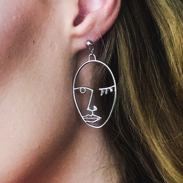 Hollow face earrings Clearance