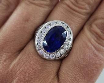 Estate Vintage Mens 14k white gold Oval cut Syn. Sapphire Ring with 1.00ctw VS1-2 F-G brilliant cut diamonds surrounding. Size: 11.50