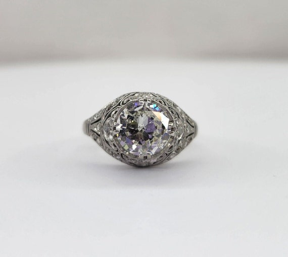 Rare Antique 1900's Edwardian Diamond Platinum Filigree ring. 1.30ct Old European Cut I1 K with .50ct rose cut diamondsside. size: 4.75 3.7g