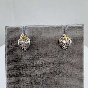 Vintage estate 14k white gold with yellow gold details. 0.10ctw SI2-I diamond heart post earrings. 1.9 grams, .46&quot;x.36&quot;