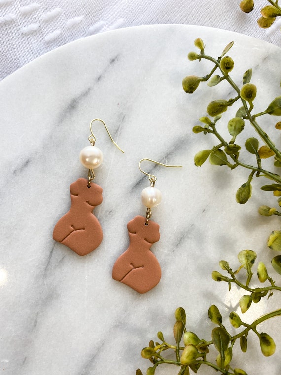 Female body earrings deals