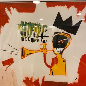 May include: Abstract artwork depicting a yellow figure playing a trumpet, with a black crown and a white background with red and white brushstrokes. The art has a bold, graphic style.