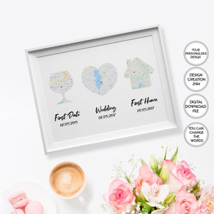 May include: A white framed print with a map of a city in the shape of a wine glass, heart, and house. The dates "08/05/2015", "08/05/2017", and "09/05/2017" are printed below each shape. The text "First Date", "Wedding", and "First Home" are printed below the dates. The text "Your Personalized Design", "Design Creation 24H", "Digital Download File", and "You Can Change The Words" is printed in a box in the upper right corner of the print.