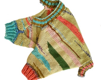 May include: A hand-knitted sweater with a unique design. The sweater features a beige base with diagonal stripes in shades of red, green, blue, and pink. The cuffs and collar have contrasting colors, including orange and turquoise. The overall style is casual and artistic.