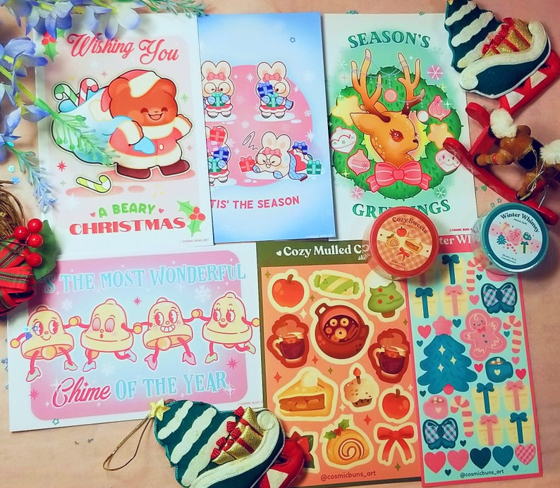 May include: A collection of Christmas greeting cards featuring illustrations of reindeer, bears, and snowmen. The cards are decorated with festive colours and patterns, including red, green, and white.