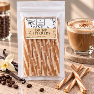May include: A clear plastic pouch containing six long, cylindrical vanilla drink stirrers with a tan and white spiral pattern. The label reads WALKSTON CANDY VANILLA DRINK STIRRERS COFFEE SWEET, featuring illustrations of a vanilla flower, coffee beans, and a cup.