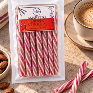 May include: A clear plastic pouch containing seven striped candy sticks. The label reads Walkston Candy Amaretto Drink Stirrers Alcoholic Coffee Sweet. The sticks feature diagonal stripes in shades of pink, white, and brown.