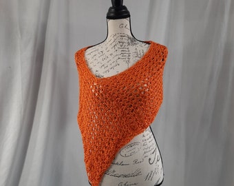 Accent wrap, poncho. Pop of color accent wrap  Keep the sun off your shoulders or drop one side for dramatic effect Orange or Green.