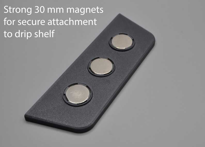 May include: A black plastic drip tray with three 30 mm strong magnets for secure attachment to a drip shelf.