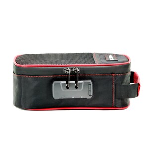 May include: Black travel case with a red trim and a combination lock. The case has a zipper closure and a carrying handle.
