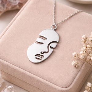 Pendentif Visage