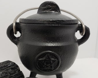 Cast Iron Cauldron Black with Pentacle Elevate your spiritual practice with our mysterious black cast iron cauldron, complete with a lid.