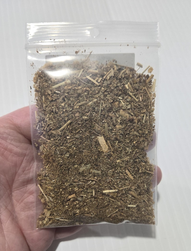 The back view of a 7g bag of Lady's Mantle from In Spyrit Metaphysical, providing a clear look at the dried, cut, and sifted botanical texture. InSpyritMetaphysical.
